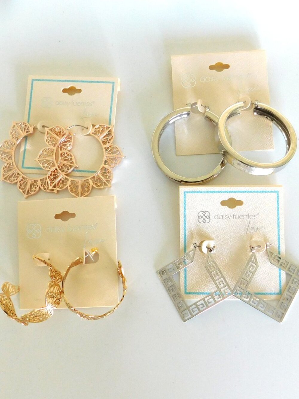 Lot of 4 Pairs Daisy Fuentes Hoop Earrings Pierced Gold and Silver Tone Metal
